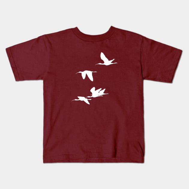 White Silhouette of Glossy Ibises In Flight Kids T-Shirt by taiche